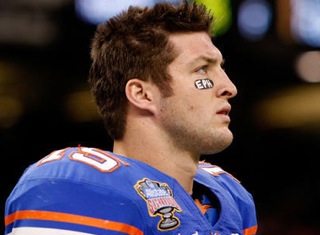 Tim Tebow, Jets' new evangelical quarterback, can bring fans to their knee  