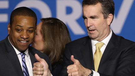 Gov.-elect Ralph Northam and Lt. Gov.-elect Justin Fairfax greet supporters at an election night rally November 7, 2017 in Fairfax, Virginia.