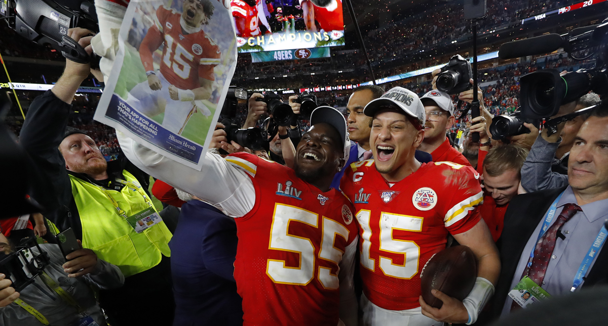 rank Clark #55 of the Kansas City Chiefs and Patrick Mahomes #15 of the Kansas City Chiefs celebrate after defeating San Francisco 49ers by 31 - 20in Super Bowl LIV at Hard Rock Stadium on February 02, 2020 in Miami, Florida.