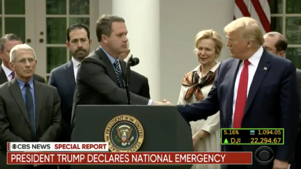 Trump shaking hands at press conference