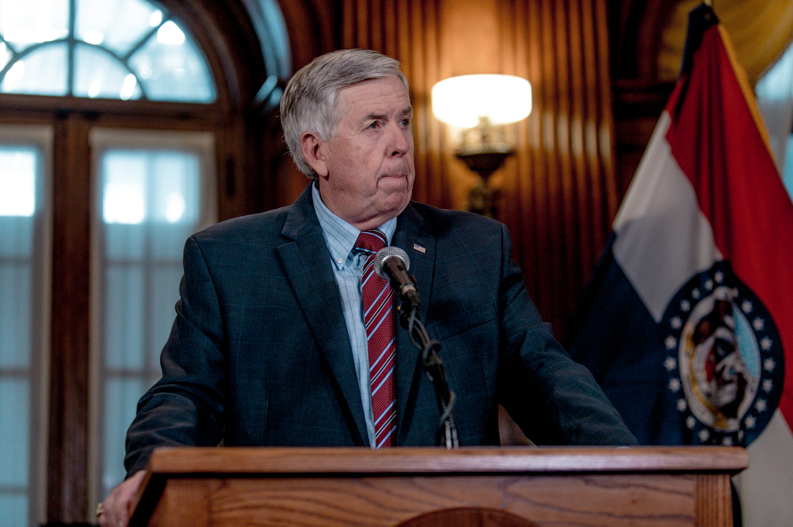 Mike Parson at a press conference