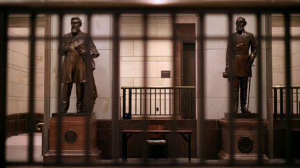 Statues of James Zachariah George (L), a colonel in the Confederate Army and U.S. Senator from Mississippi, and Edmund Kirby Smith, a native Floridian and a Confederal general, stand inside the U.S. Capitol Visitors Center.