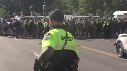 Protestors Block Access to Mt. Rushmore by Parking Disabled Vans Across Road