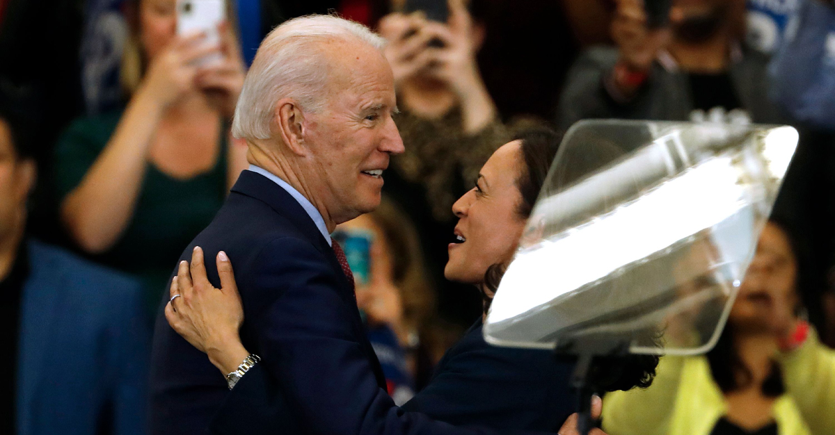 Senator Kamala Harris hugs Democratic presidential candidate former Vice President Joe Biden after she endorsed him at a campaign rally at Renaissance High School in Detroit, Michigan in March 2020.