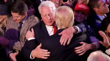 Donald Trump hugs his brother Robert Trump