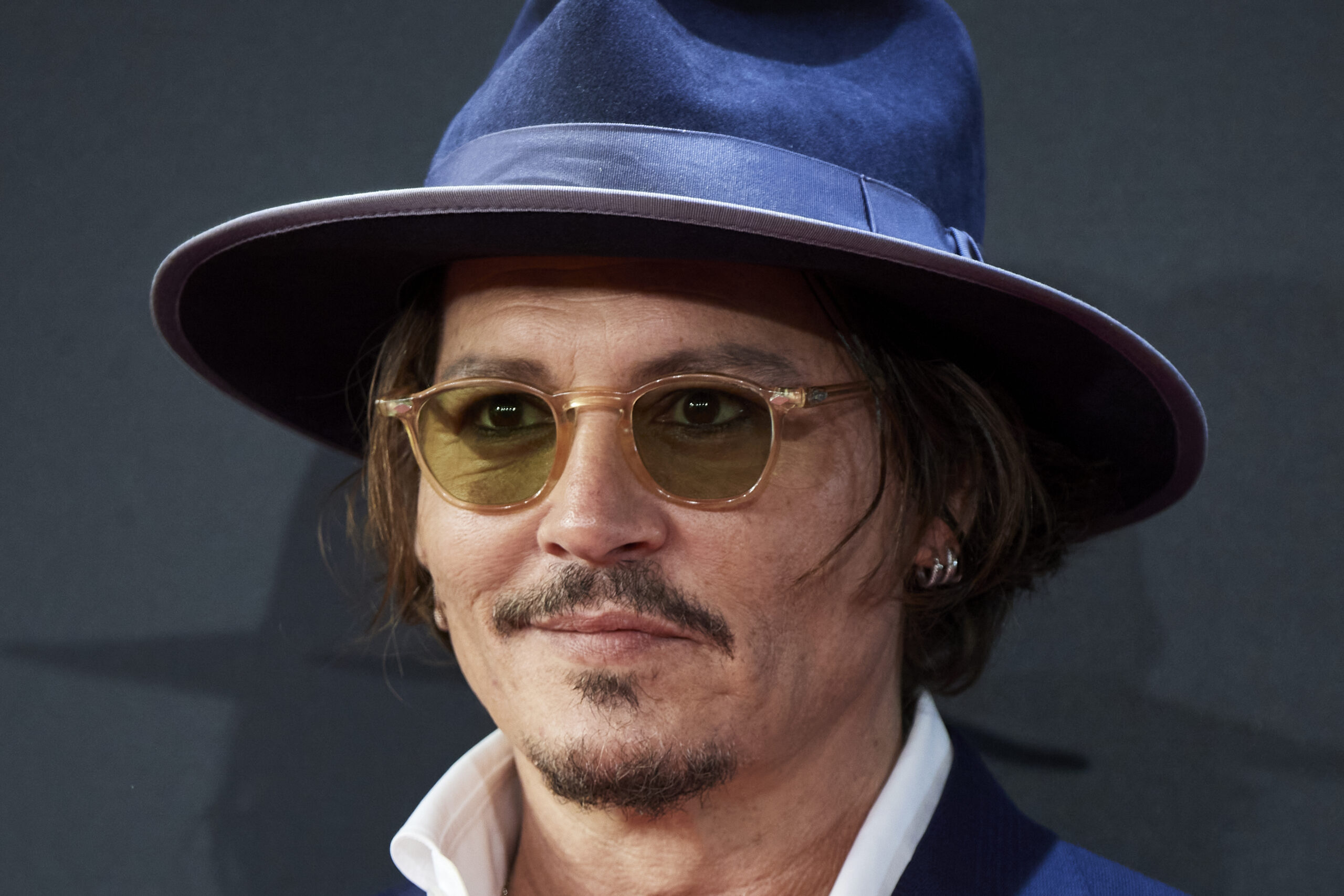 Johnny Depp Loses Suit Over The Sun's Amber Heard Story