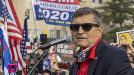 WASHINGTON, DC - DECEMBER 12: Former General Michael Flynn, President Donald Trump’s recently pardoned national security adviser, speaks during a protest of the outcome of the 2020 presidential election outside the Supreme Court on December 12, 2020 in Washington, DC. Thousands of protesters who refuse to accept that President-elect Joe Biden won the election are rallying ahead of the electoral college vote to make Trump's 306-to-232 loss official. (