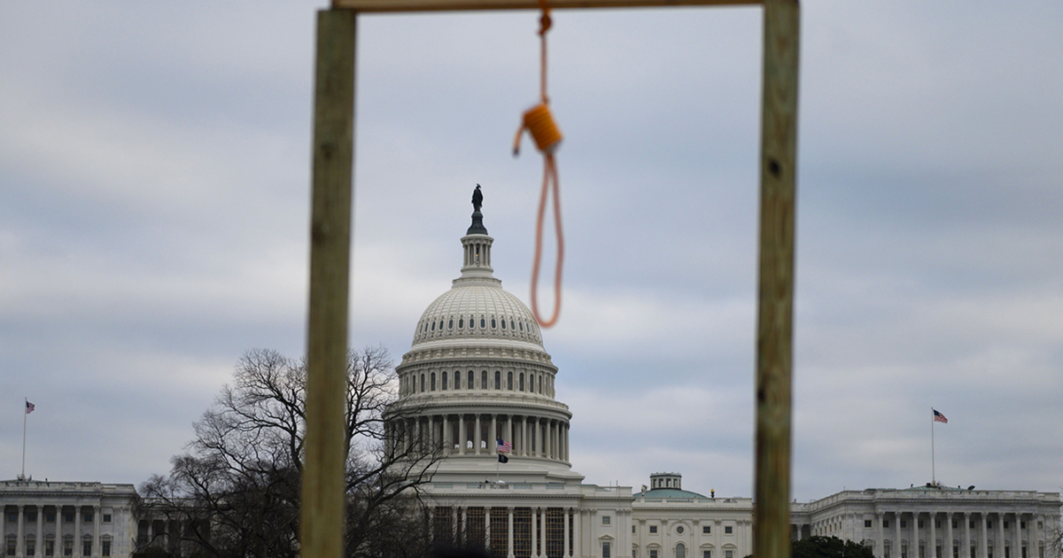 A noose is seen on makeshift gallows as supporters of US President Donald Trump gather on the West side of the US Capitol in Washington DC on January 6, 2021.