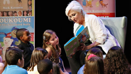 Actress Olympia Dukakis reads to children