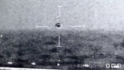 spherical object floats over water