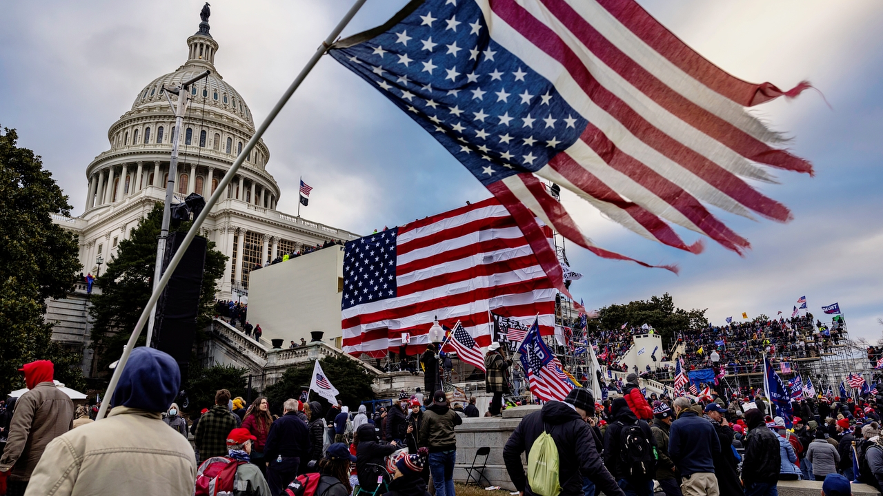 WASHINGTON, DC - JANUARY 6: Pro-Trump protesters gather in front of the U.S. Capitol Building on January 6, 2021 in Washington, DC. Trump supporters gathered in the nation's capital to protest the ratification of President-elect Joe Biden's Electoral College victory over President Trump in the 2020 election. A pro-Trump mob later stormed the Capitol, breaking windows and clashing with police officers. Five people died as a result. (Photo by Brent Stirton/Getty Images)