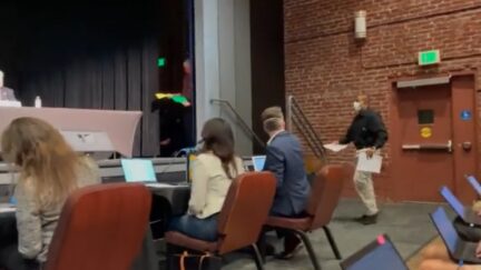 John Cox getting served