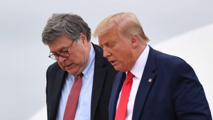 US President Donald Trump (R) and US Attorney General William Barr step off Air Force One upon arrival at Andrews Air Force Base in Maryland on September 1, 2020. - US President Donald Trump said September 1, 2020 on a visit to protest-hit Kenosha, Wisconsin that recent anti-police demonstrations in the city were acts of 