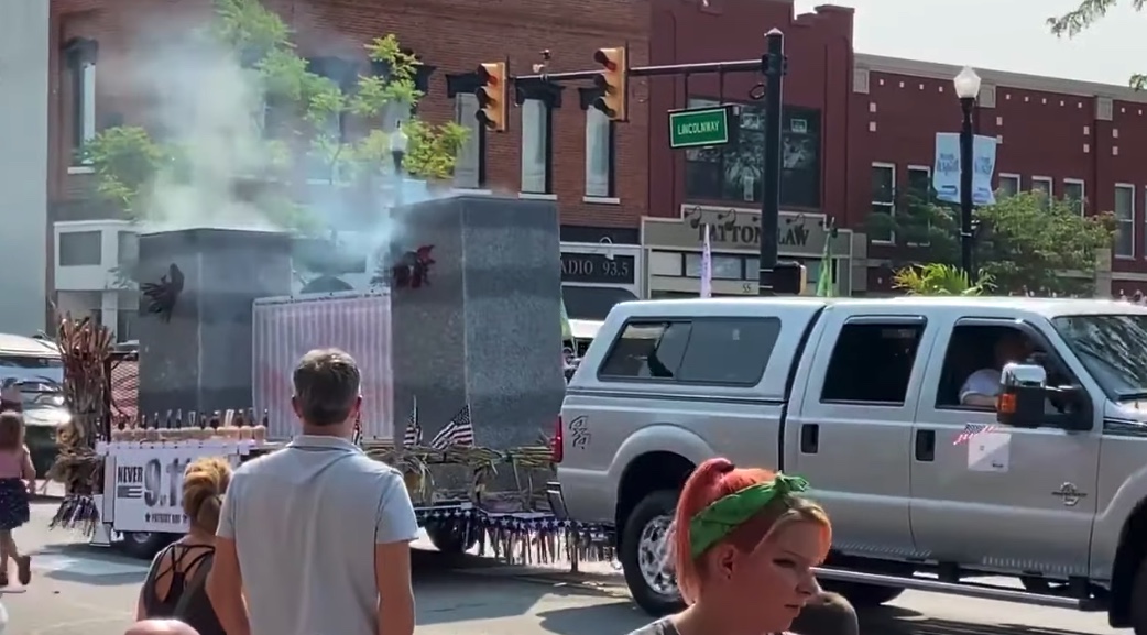A weird 9/11 parade float rolls by