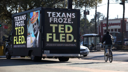 texans froze ted cruz fled digital billboard truck sign