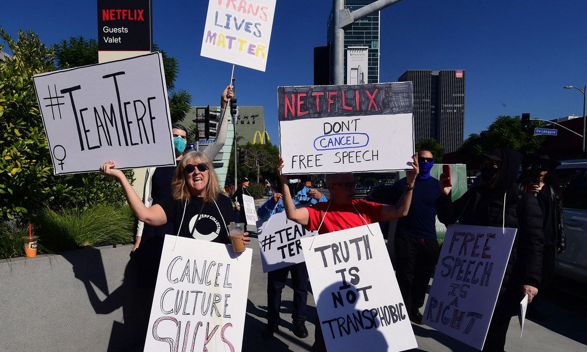People rally in support of Dave Chappelle at the Netflix walkout in Los Angeles, California on October 20, 2021
