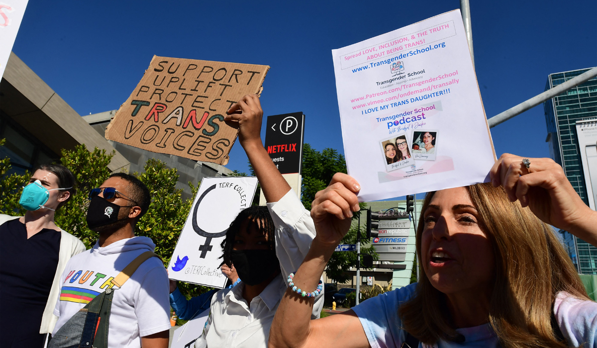 People rally in support of the Netflix transgender walkout in Los Angeles, California on October 20, 2021