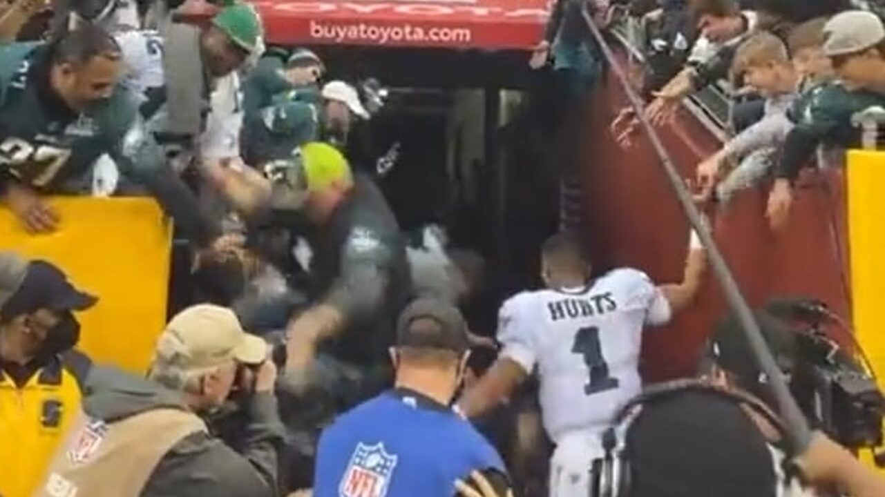 Eagles QB Jalen Hurts nearly sacked after railing collapses, fans fall at  FedEx Field