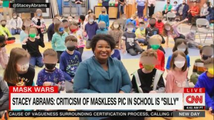 Stacey Abrams maskless with masked kids