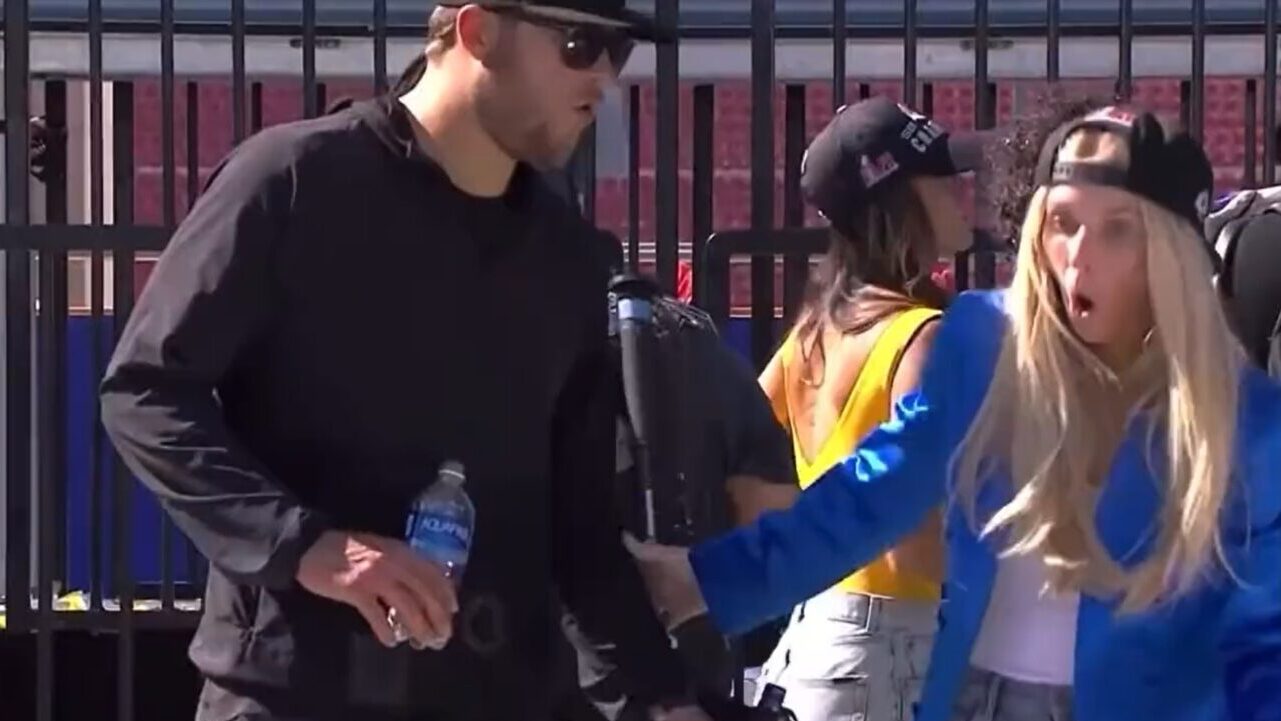 Matthew Stafford watches woman fall off stage