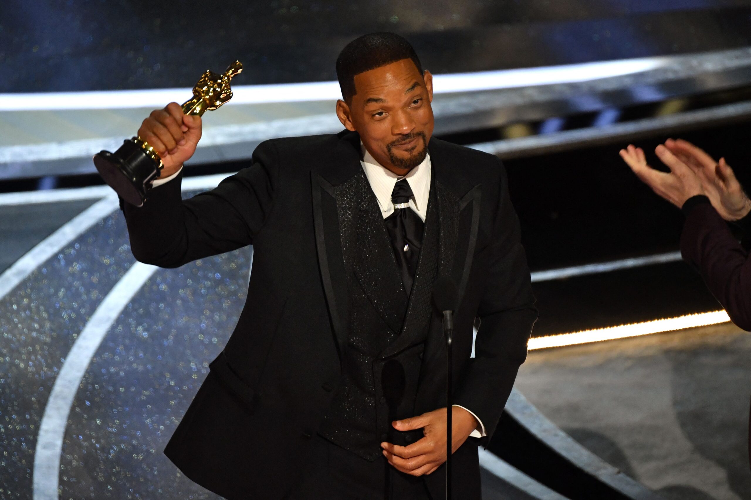 Will Smith holds up Oscar for Best Actor