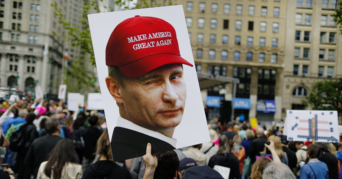 NEW YORK, NY - JUNE 03: A demonstrator holds up a sign of Vladimir Putin during an anti-Trump 'March for Truth' rally on June 3, 2017 in New York City. Rallies and marches are taking place across the country to call for urgent investigation into possible Russian interference in the U.S. election and ties to U.S. President Donald Trump and his administration. (Photo by Eduardo Munoz Alvarez/Getty Images)