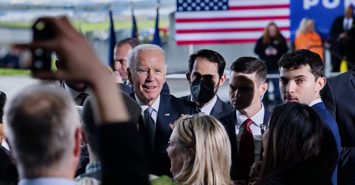 PORTLAND, OR - APRIL 21: U.S. President Joe Biden takes photos with the crowd after delivering remarks on infrastructure at the Portland Air National Guard Base on April 21, 2022 in Portland, Oregon. The speech marks the beginning of the president's multi-day trip to the Northwest, with stops in Portland and Seattle Washington. (Photo by Nathan Howard/Getty Images)