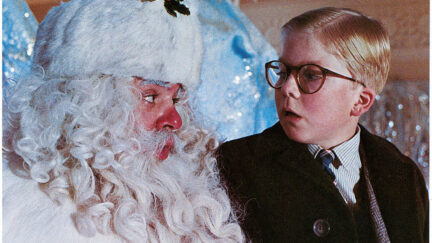 promotional photo from A Christmas Story showing Peter Billingsley with Santa