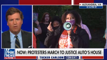 Woman giving middle finger