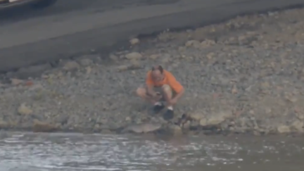 Man catches Fish On Ohio River