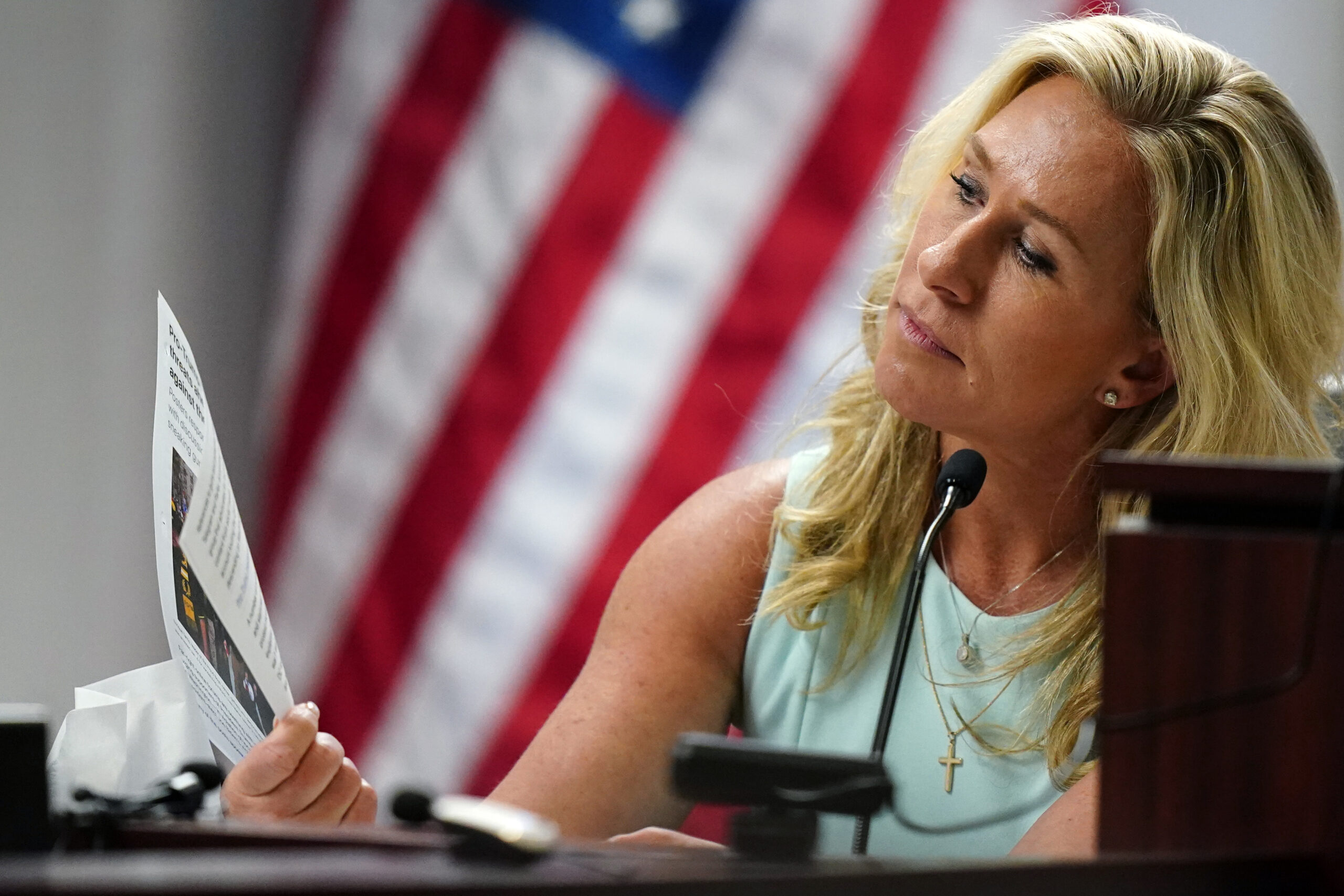 Marjorie Taylor Greene pretending to read