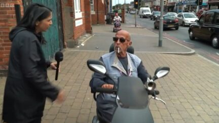 man on scooter reacts to Boris Johnson resigning