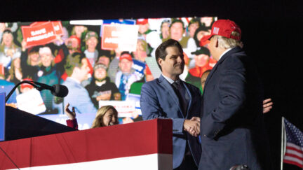 Matt Gaetz shaking hands with Donald Trump