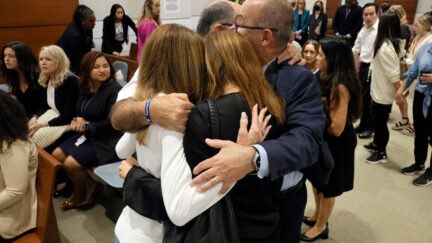Parkland families hug while awaiting verdict