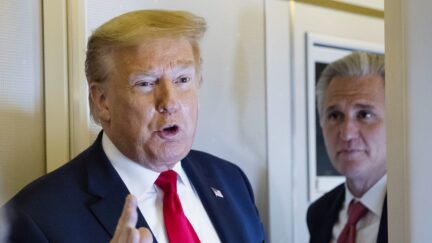 President Donald Trump, with House Minority Leader Kevin McCarthy of Calif., speaks with reporters while in air en route to Andrews Air Force Base Saturday, May 30, 2020, in flight.