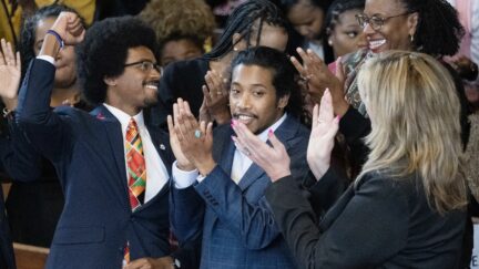 Expelled Rep. Justin Pearson, D-Memphis, from left, expelled Rep. Justin Jones, D-Nashville, and Rep. Gloria Johnson, D-Knoxville, are recognized by the audience at Fisk University before Vice President Kamala Harris arrives, Friday, April 7, 2023, in Nashville, Tenn.