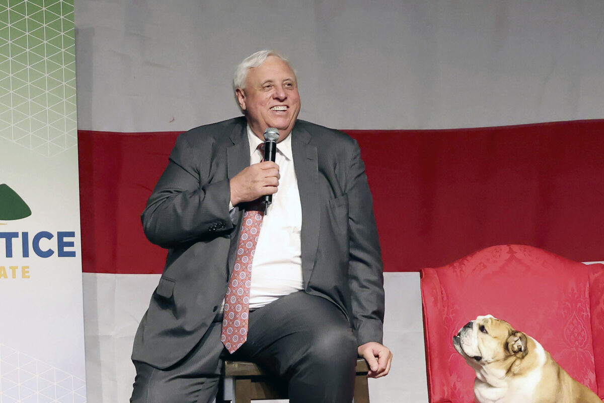 Jim Justice and a dog