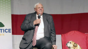 Jim Justice and a dog