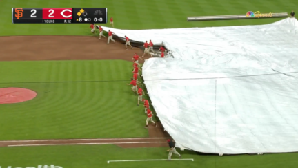 Grounds crew member gets trapped under tarp