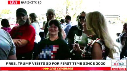 RSBN Host Praises Trump Fan At Rally Wearing Slur Against Kamala Harris So Offensive She Refuses To Say It Out Loud