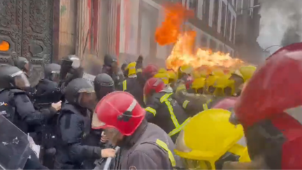 Firefighters use flamethrower on cops in Spain protest