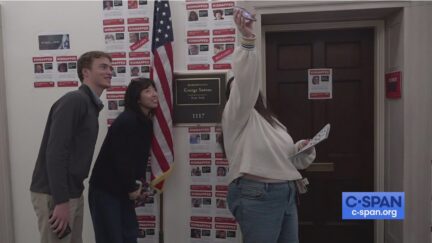 Capitol staffers outside George Santos's office