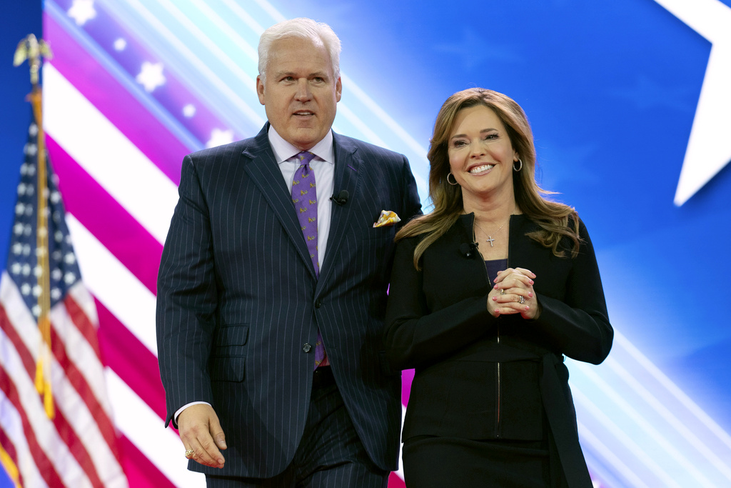Matt Schlapp, chairman of the American Conservative Union, left, and his wife Mercedes Schlapp attend the Conservative Political Action Conference, CPAC 2024, at the National Harbor in Oxon Hill, Md., Thursday, Feb. 22, 2024.