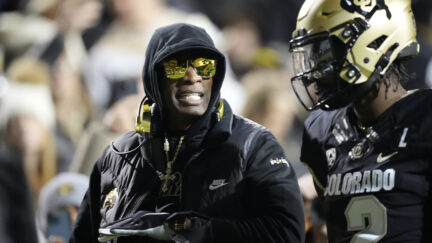 Colorado football coach Deion Sanders and QB Shedeur Sanders