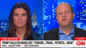 Kaitlan Collins and Jared Polis