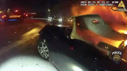 Arizona cop rescues woman from car fire