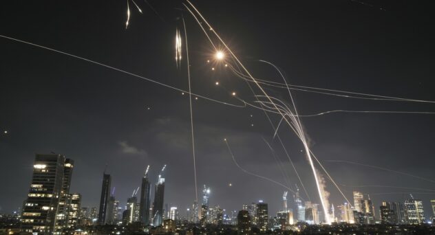 Israeli Iron Dome air defense system fires to intercept missiles over Tel Aviv, Israel, Friday, June 13, 2025.
