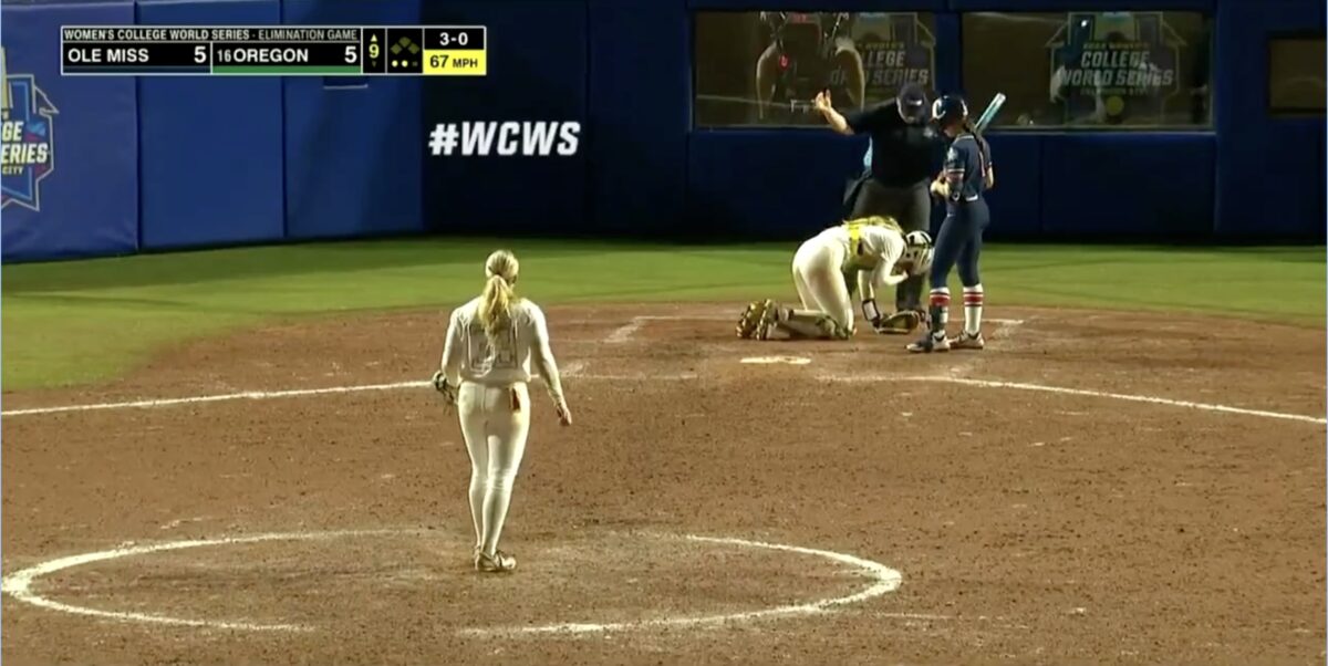 Softball hits clump of dirt mid-air into catcher's eye