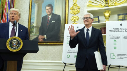 President Donald Trump introduces Apple CEO Tim Cook in the Oval Office, Wednesday, Aug. 6, 2025, in Washington.
