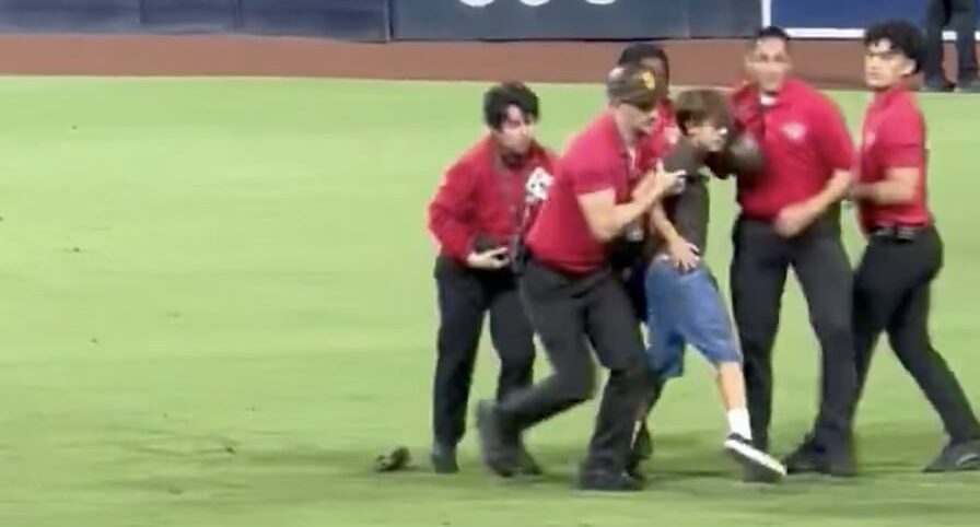 Padres fan taken down by security